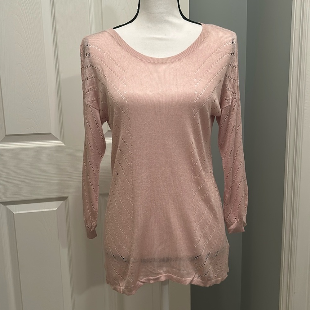 Express light weight sweater with 3/4 length sleeves.